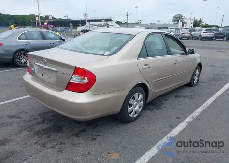 2002 Toyota Camry Le from USA, damaged, VIN 4T1BE30K42U106391